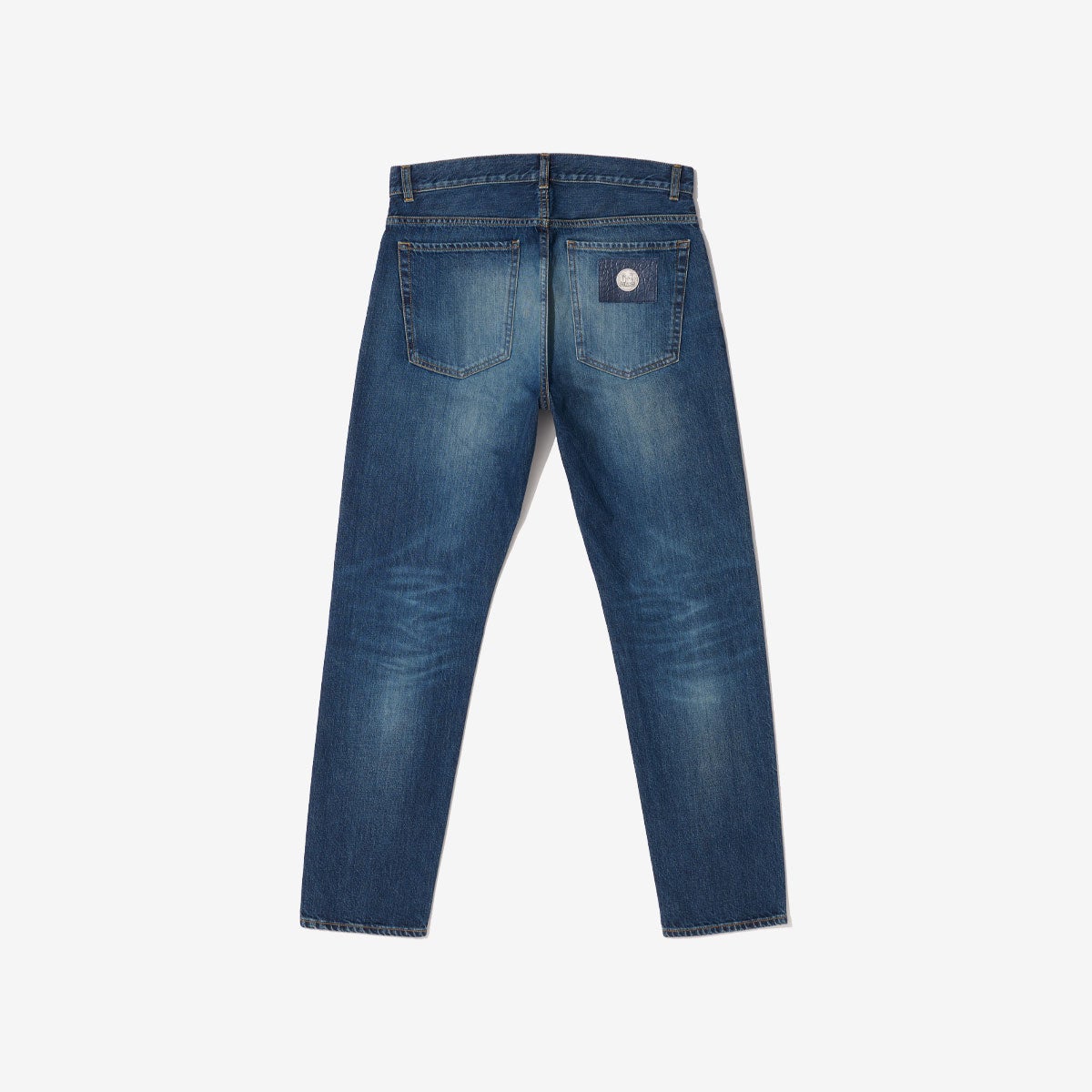 G-FRANCOのメンズデニムBACCOバッコの革タグ正面からの画像